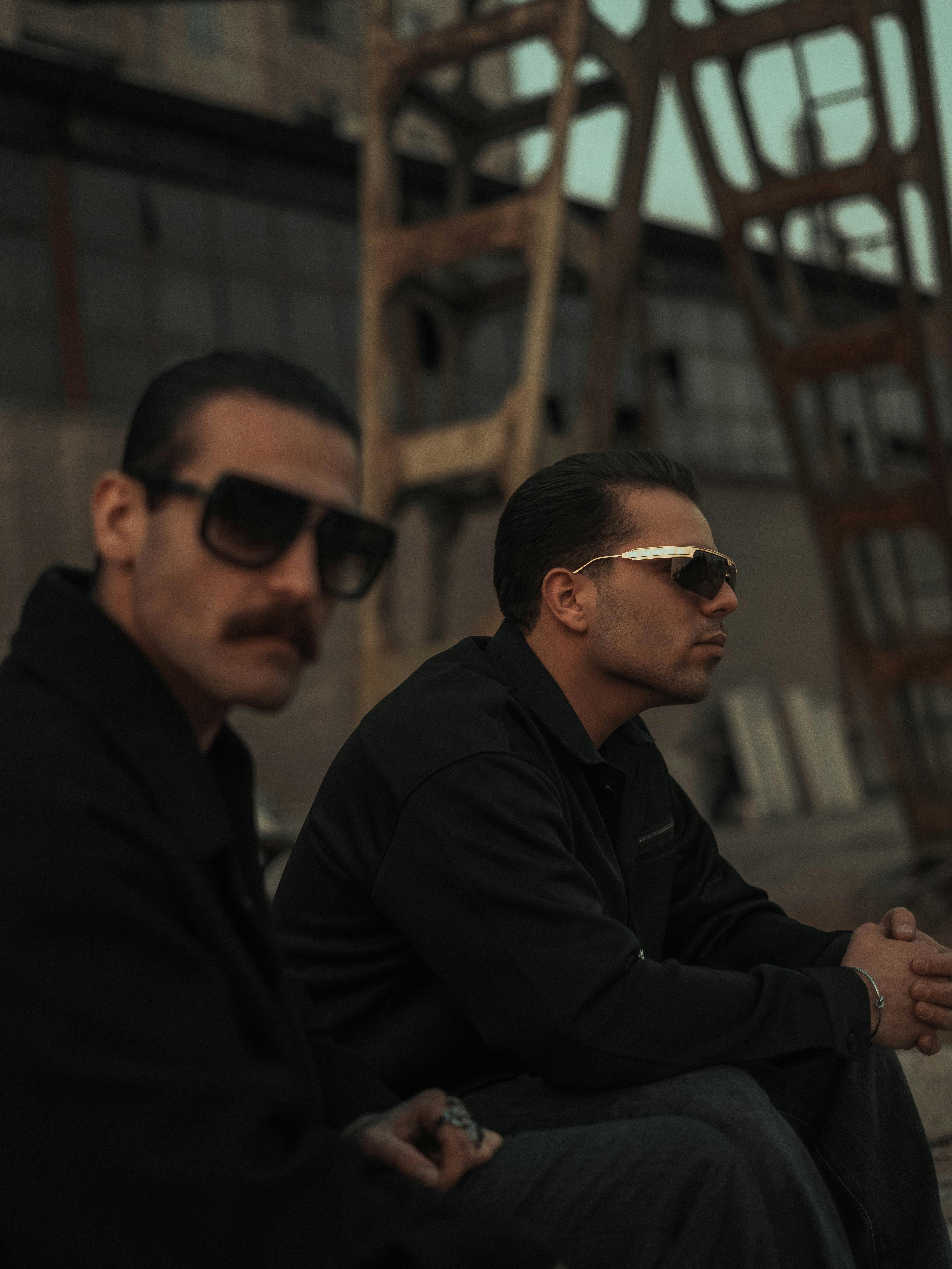 Acetate and metal sunglasses displayed side by side